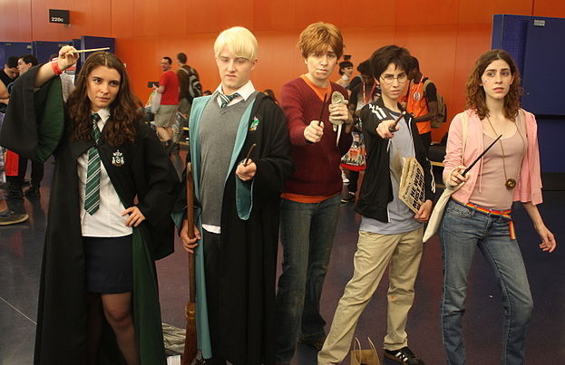 Understandably, the guy who got stuck cosplaying as Draco Malfoy does not look happy about it. (Image: Pikawil/wikimedia)